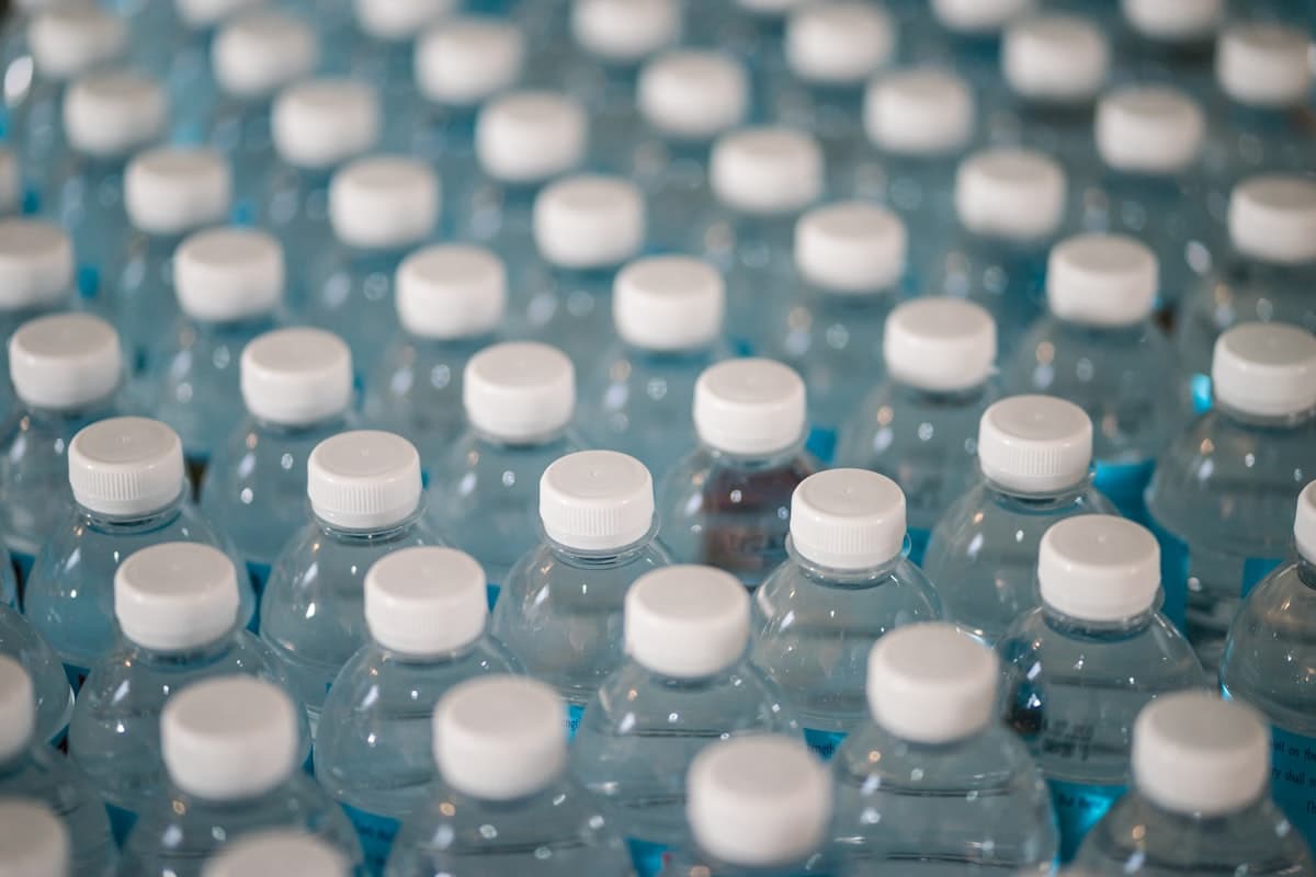 Rows of polymer bottles in production